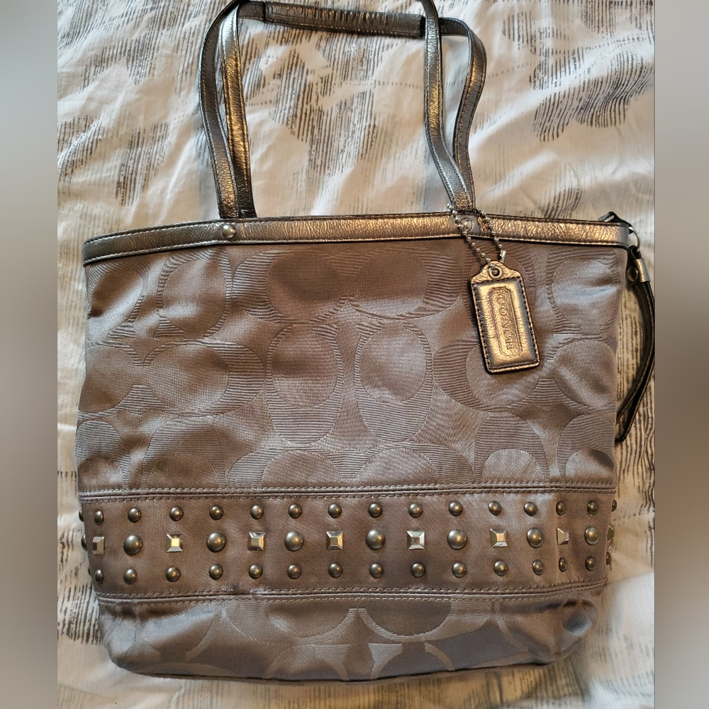 Studded Coach logo handbag